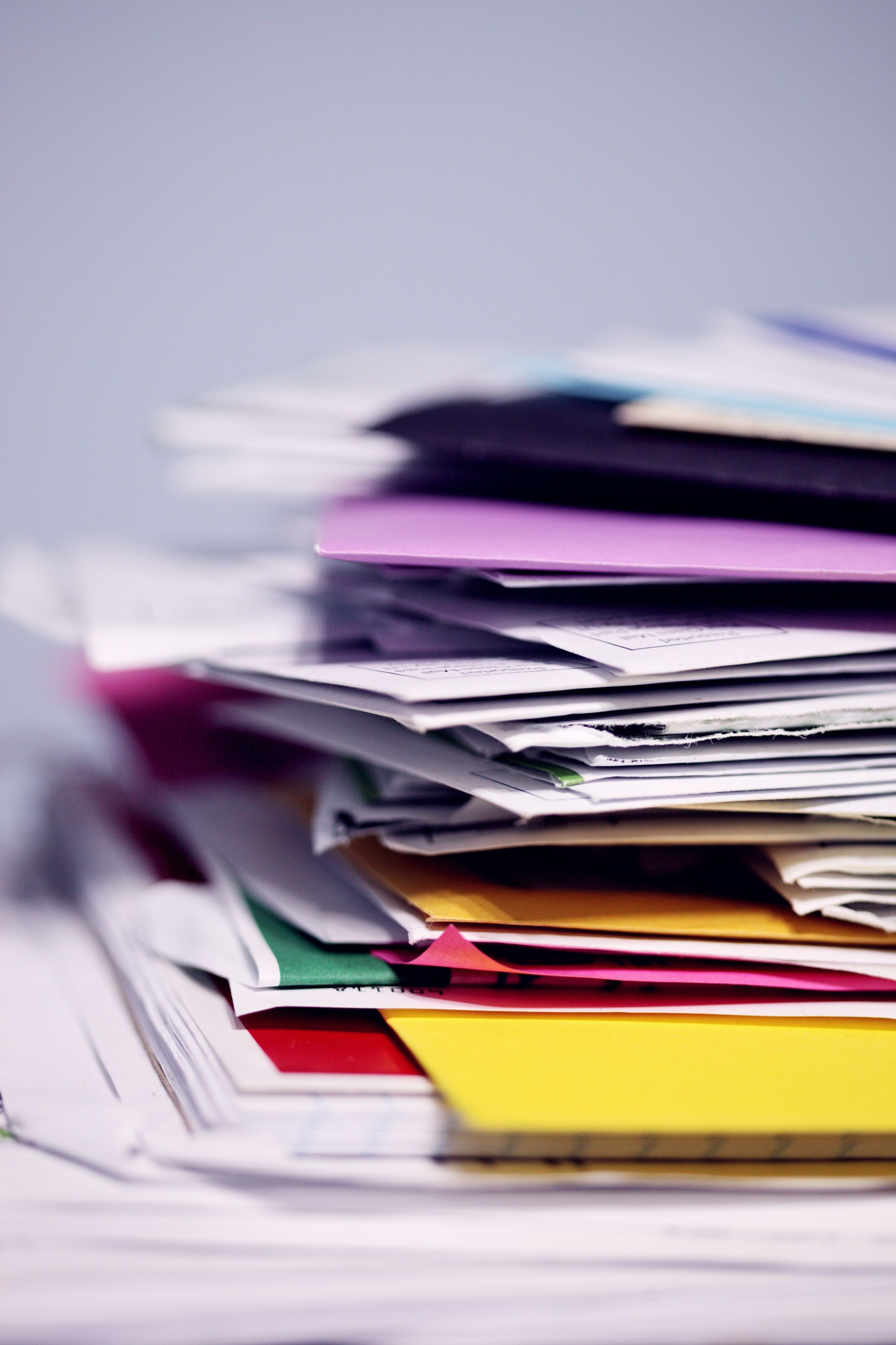 Disorganized pile of company documents