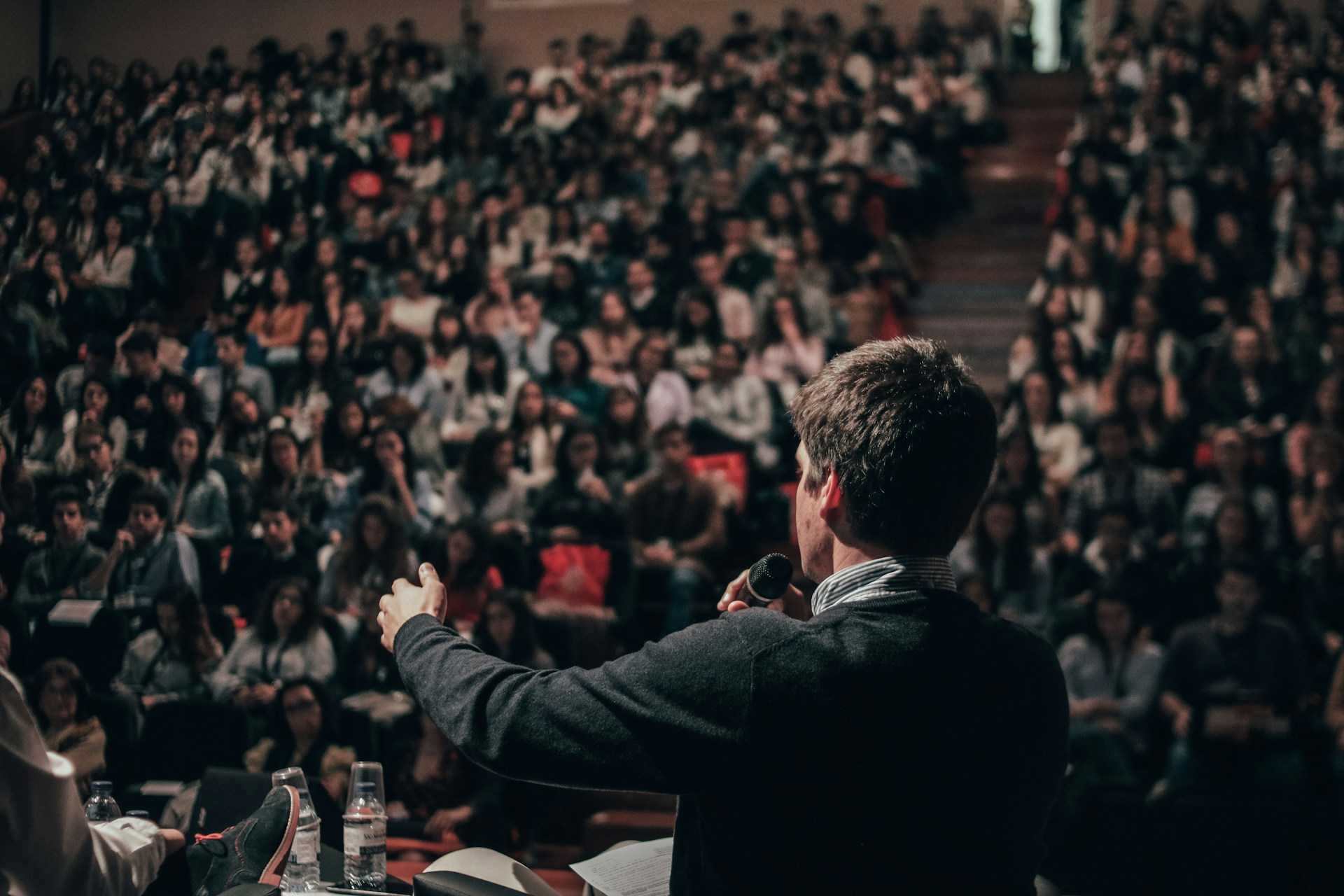 a speaker delivering an address to a professional association